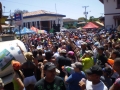 Revelers being sprayed by a water truck during carnival in Las Tablas, Panama.