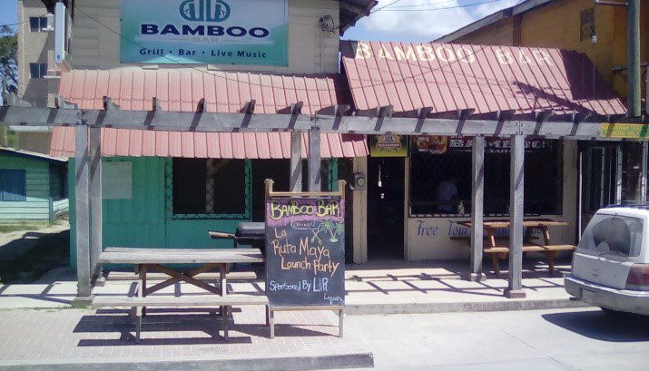 A local bar with picnic tables outside