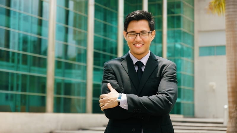 Portrait of happy and confident young businessman.