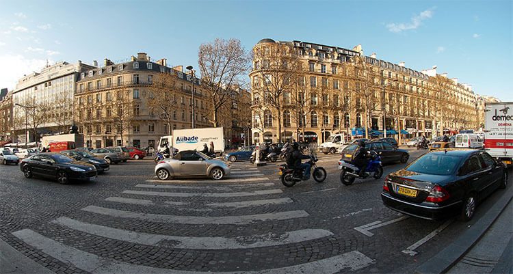 cars driving on champs elysees in Paris