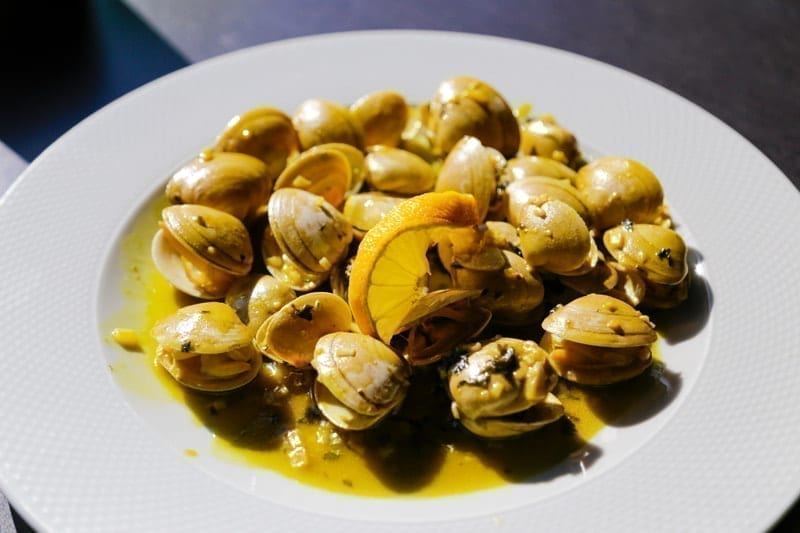 Plate of traditional Portuguese clams in garlic