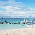 Boats ashore on a beach in Boracay, Philippines