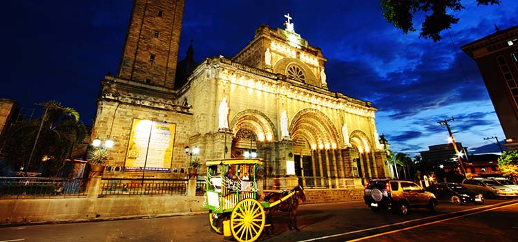 Cathedral in manila lit up at night