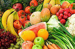 Fresh produce including watermelon, apples, oranges,carrots, tomatos, pears, bananas, and mangos