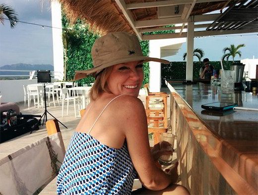 Liz Larroquette enjoying a cocktail and a view