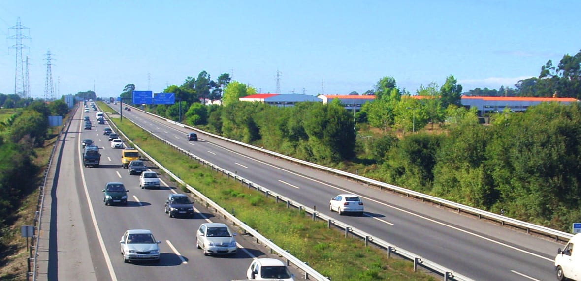 cars driving on a highway on a sunny day in Portugal