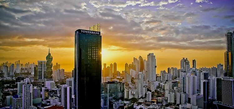 A view of Panama's financial district with Tower Bank in the forefront and the sunset in the back