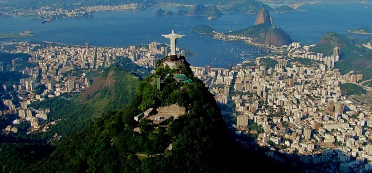 An aerial view of Rio de Janeiro, Brazil with christ the redeamer overlooking the city