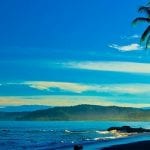 A view of the nice, blue skied, tropical climate in Costa Rica along the beach