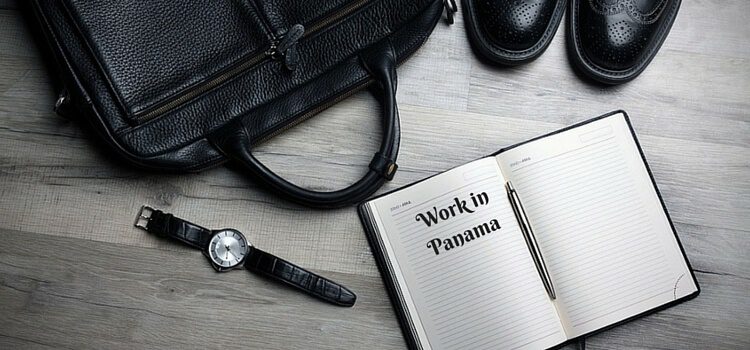 A man getting ready for work in Panama with his black briefcase, watch, and notebook
