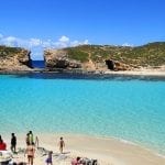 beachgoers on the beach in Malta