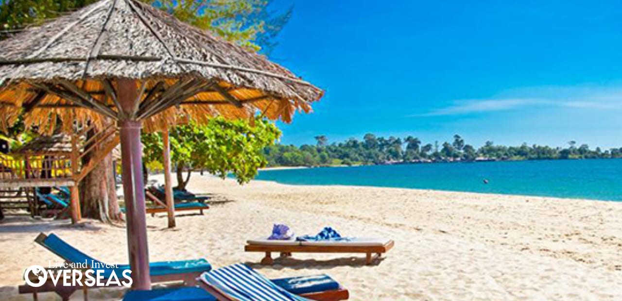 Sihanoukville Cambodia World S Est Place To Live Well Blue Lounge Chairs With Umbrellas On The Beach