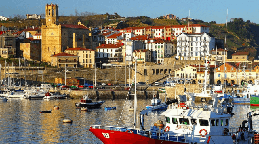 Getaria is tucked below a hillside and backed by miles of green rolling countryside.
