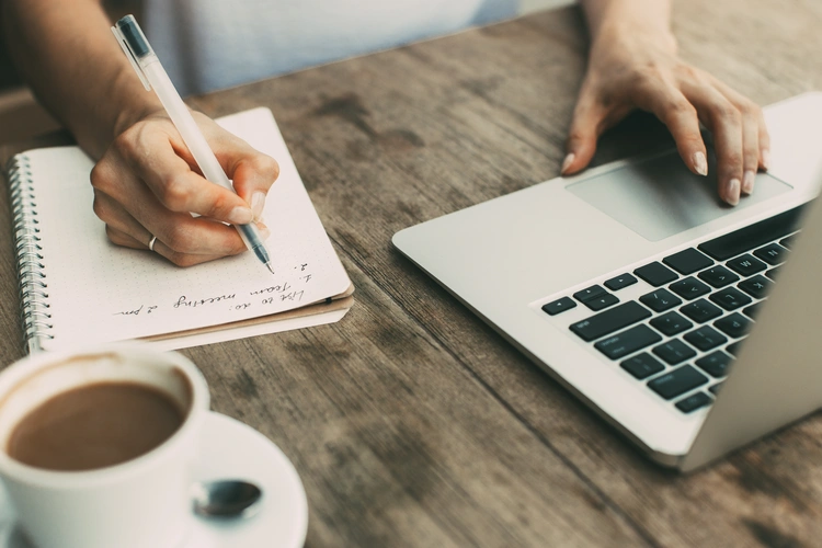 Cropped View of Woman Working on Laptop. Run A Business