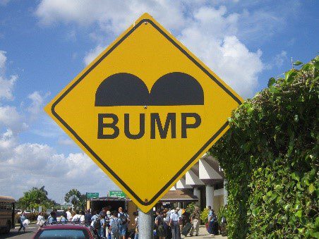 A speed bump sign in Belize