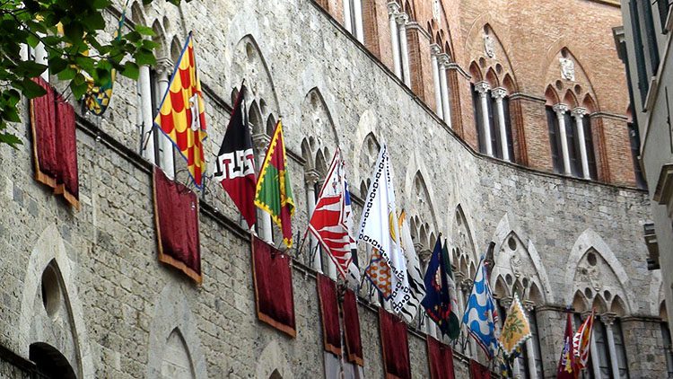 Flags representing the 17 Contrade, or distrcits, of Siena