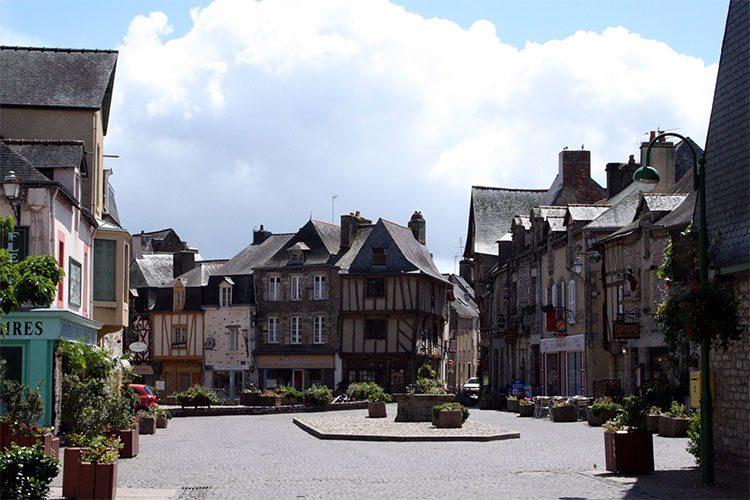 Quaint town square with stone buildings in Morbihan