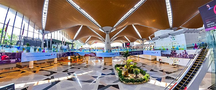 a modern airport terminal in Kuala Lumpur