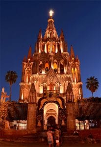 A beautiful baroque cathedral lit up at night
