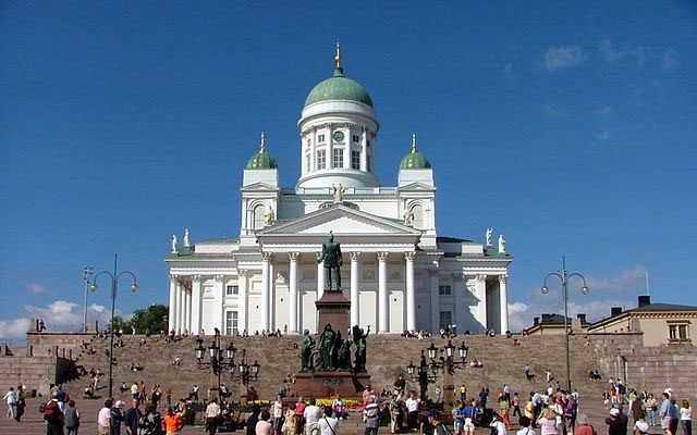 a white cathedral in a plaza in helsinki