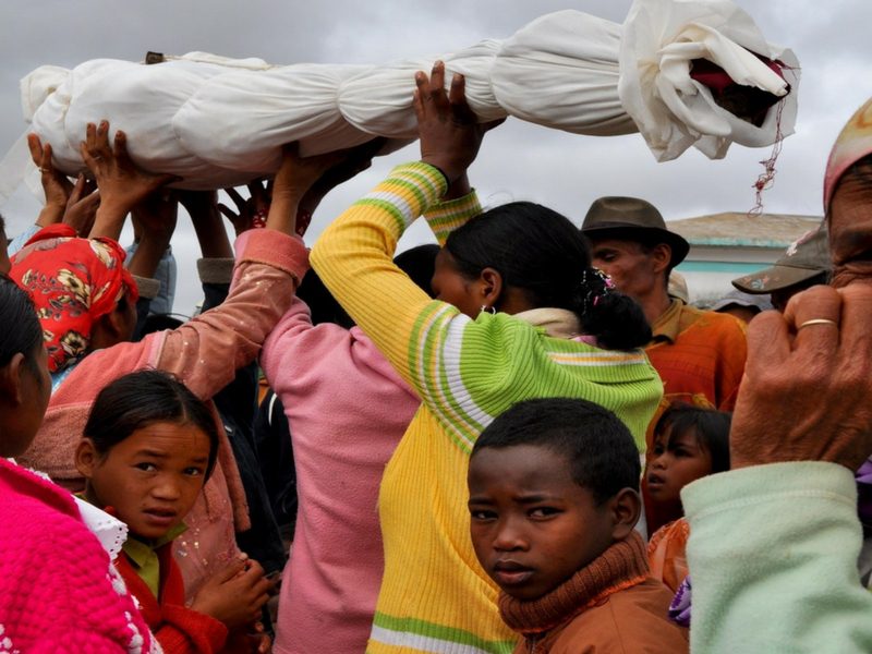 People celebrating the Famadihana festival in Madagascar.