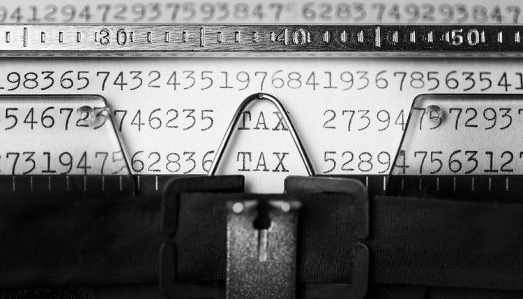 tax written on an old typewriter