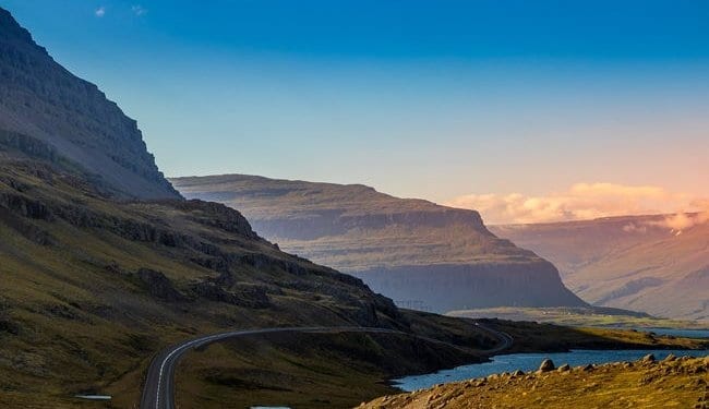 A quiet road through the mountains in Iceland