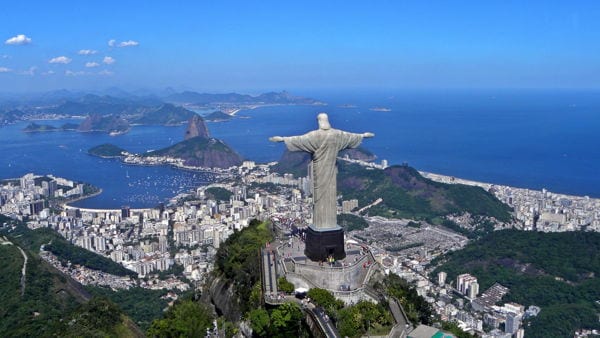 Christ the redeemer statue with city of Rio in the background