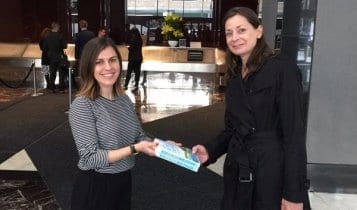 Kathleen Peddicord collecting the new edition of her book from her publishers office