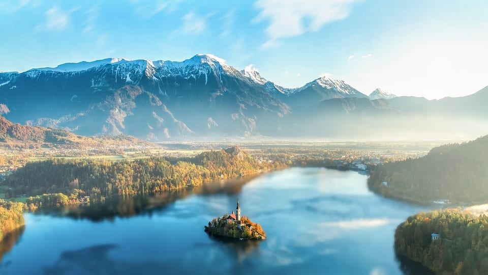 Aerial view of Lake Bled and the surrounding wilderness