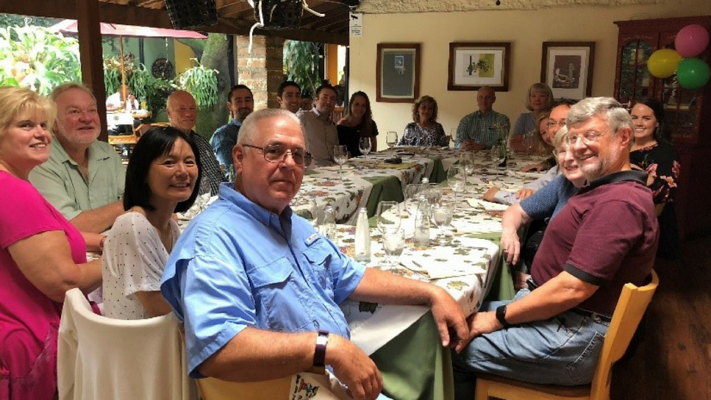 Live And Invest Overseas Conference attendees share lunch in Medellin, Colombia