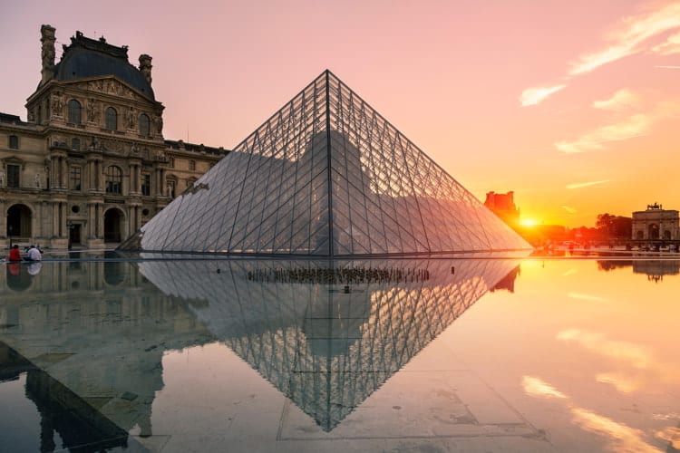 Louvre pyramid at sunset