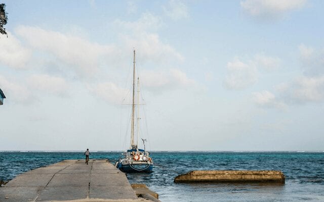 Yacht by jetty in Belize
