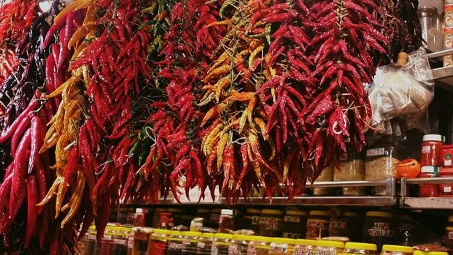 Chillies hanging up at Barcelona market