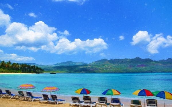 beach with umbrellas in Las Terrenas Dominican Republic
