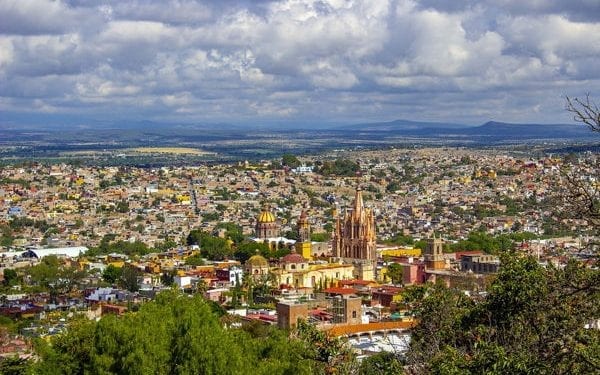 View across Mexico City of cathedral and out to mountains
