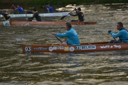 Traditional canoe being rowed in Belize