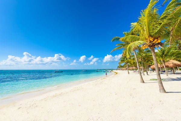 Akmal beach palm trees, white sand and blue sea