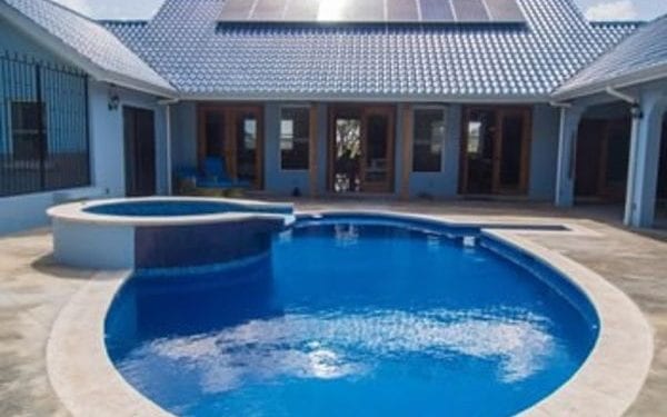 Green living overseas swimming pool in Belize