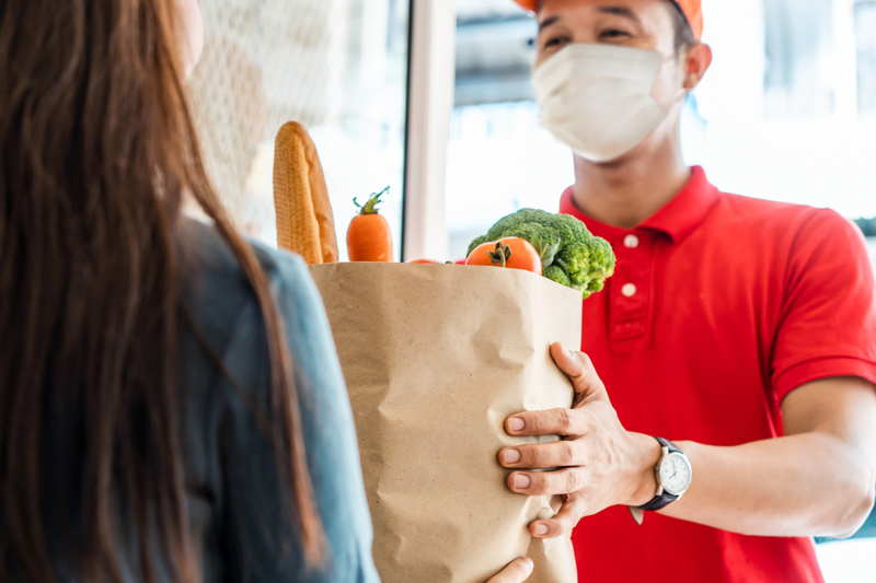a delivery driver with fresh goods