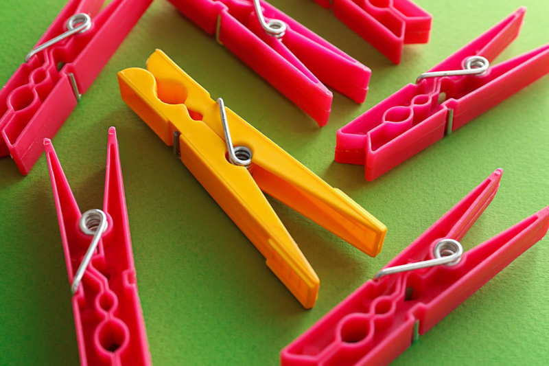 brightly colored clothes pegs
