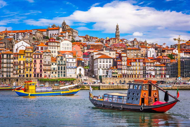 Porto river with boats and city in the background