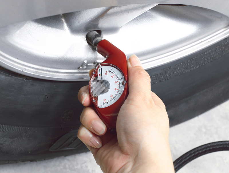 checking tire pressure
