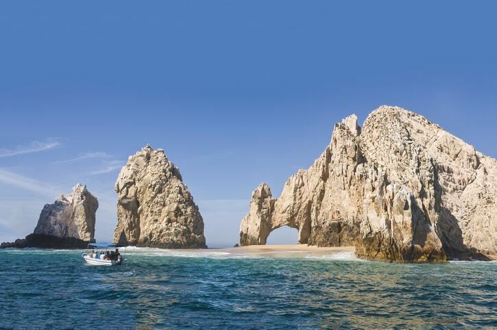 Bue sea and a small boat in Cabo, Mexico