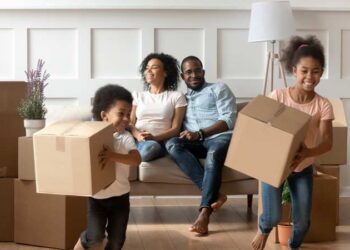 a family moving into a new house. moving overseas with kids