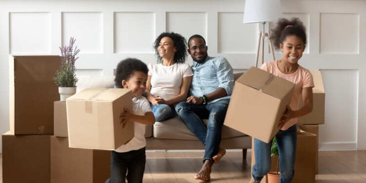 a family moving into a new house. moving overseas with kids