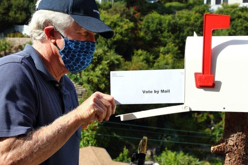 Man mailing his vote