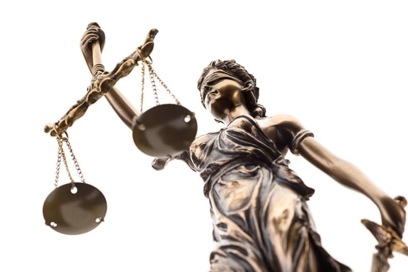Statue of justice representing crime in Belize. 
