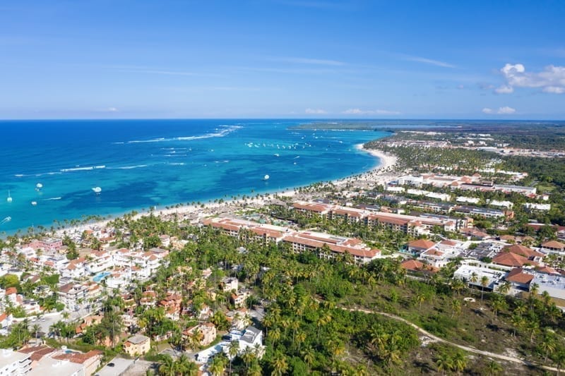 Aerial view from drone on Caribbean sea coastline with resorts. Dominican Republic