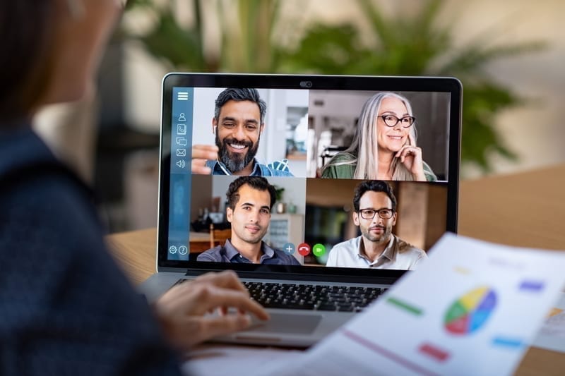 Friend group using laptop for a online meeting in video call.